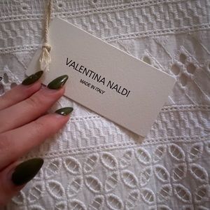 Italian brand mini dress size is L but runs really small